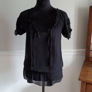 Sheer black blouse